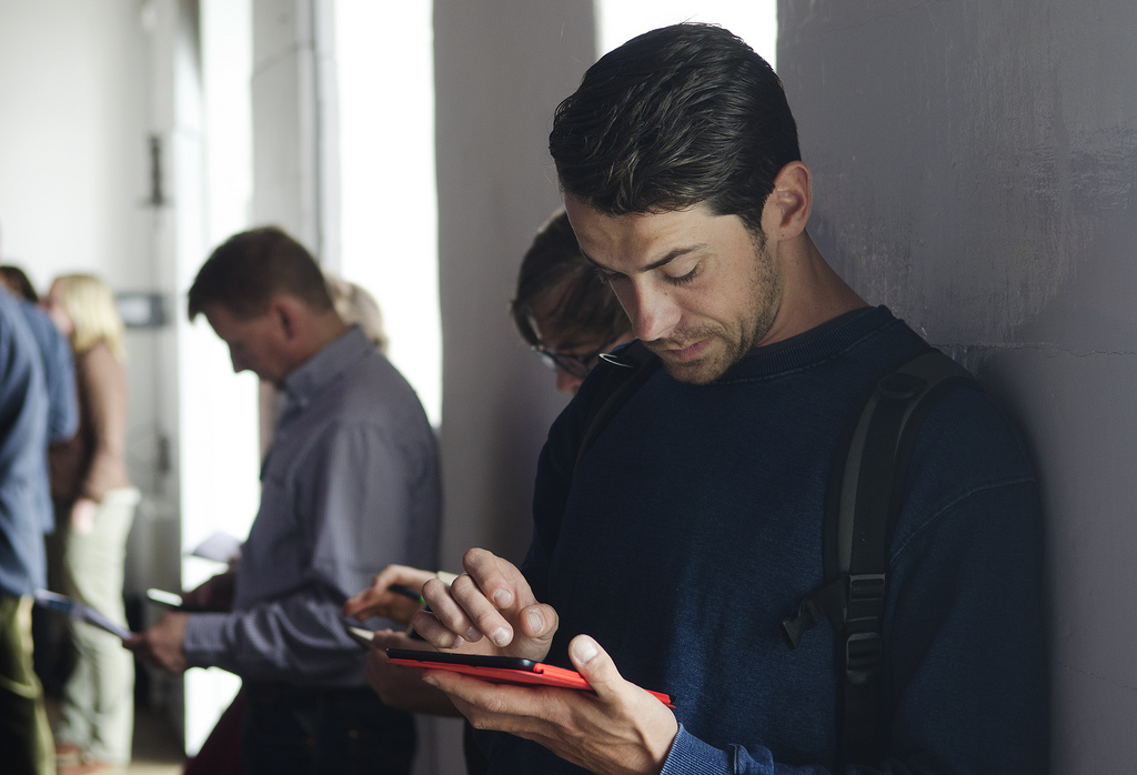 man with iPad